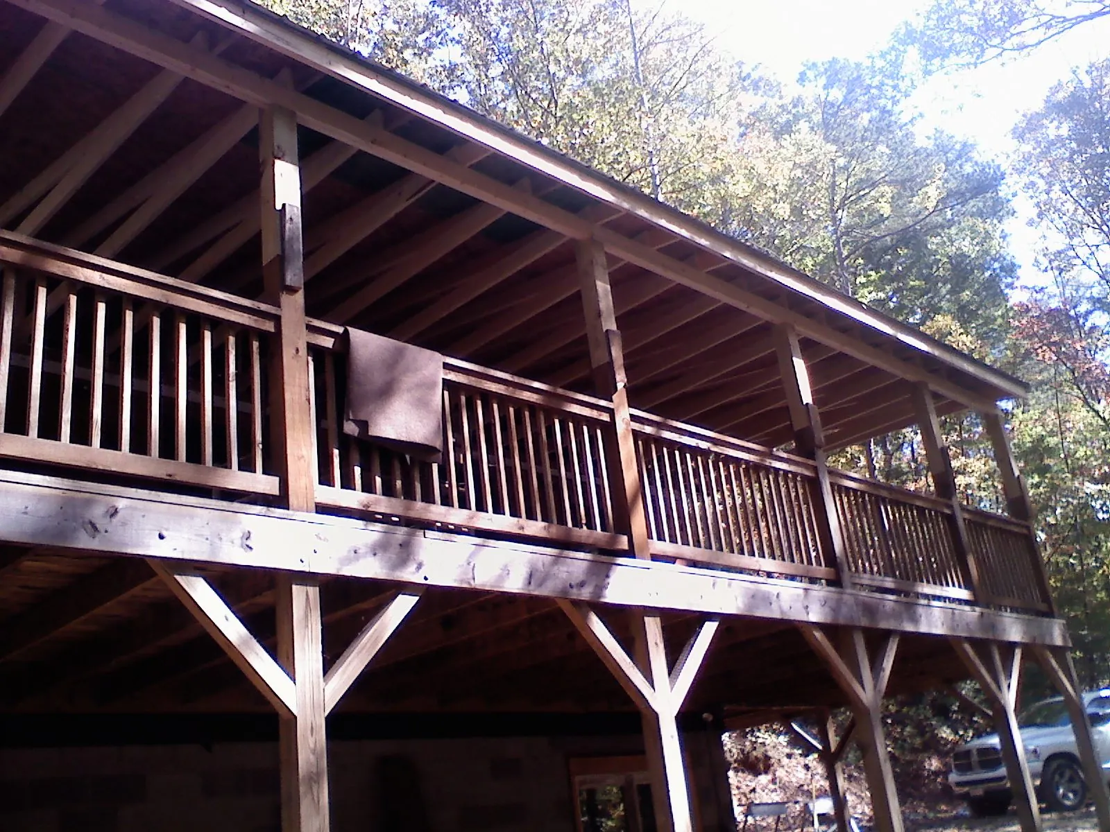 Timber framing under a new elevated porch and deck — Roof Leak Repair in Gouldsboro by Roofing Brothers